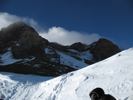 Click for full-size gallery. Looking up at part of the summit.