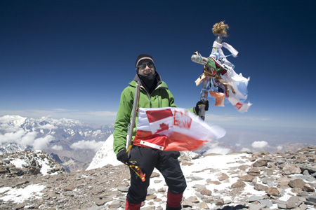 Click for full-size gallery. The cross I am holding is the sign of Aconcagua's summit.