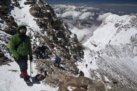 Click for full-size gallery. Me with the other face of Aconcagua visible in the back.
