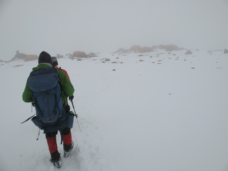 Click for full-size gallery. Our camp, shrouded in fog and falling snow.